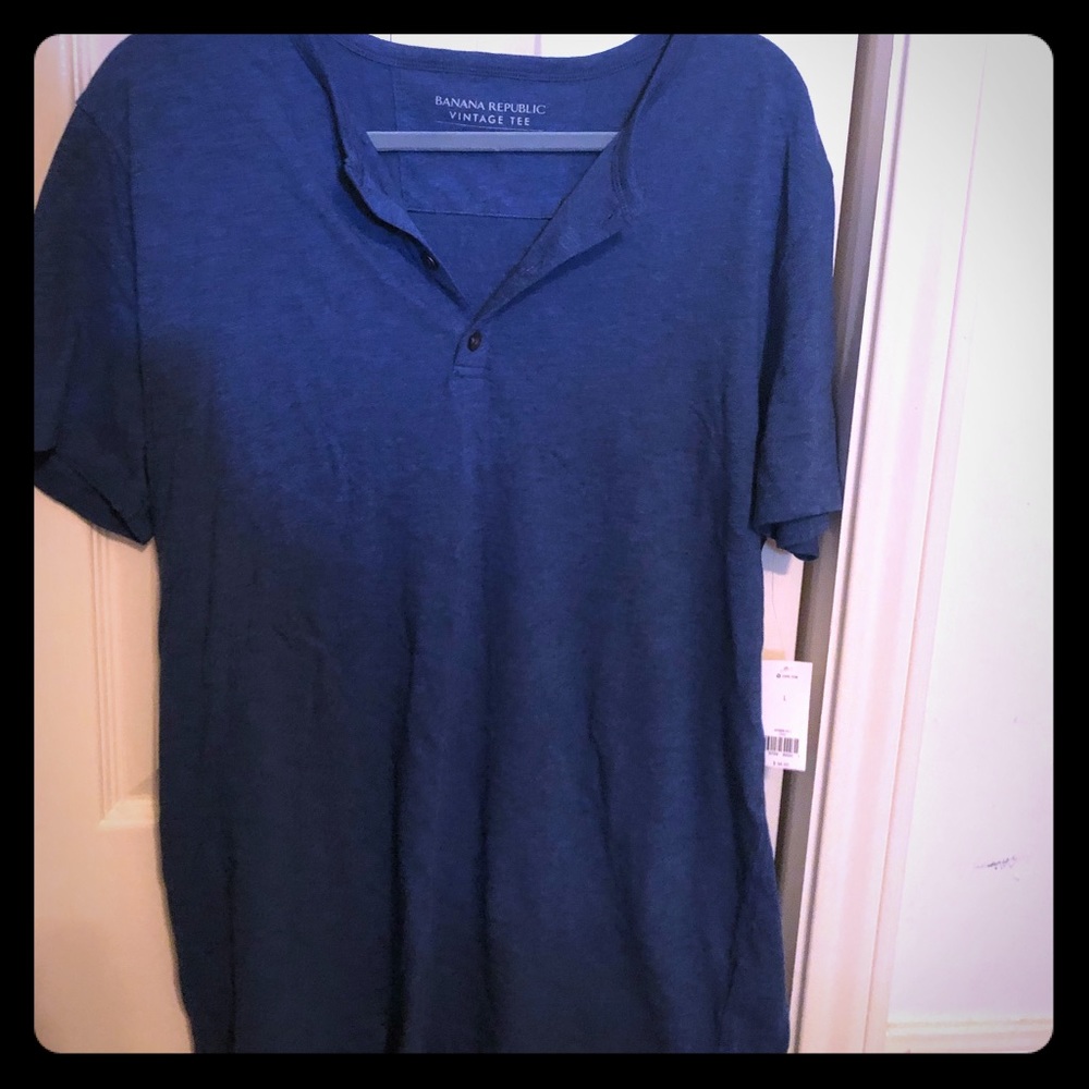 Never worn, tag still on, large blue shirt